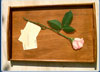 vassoio con rosa